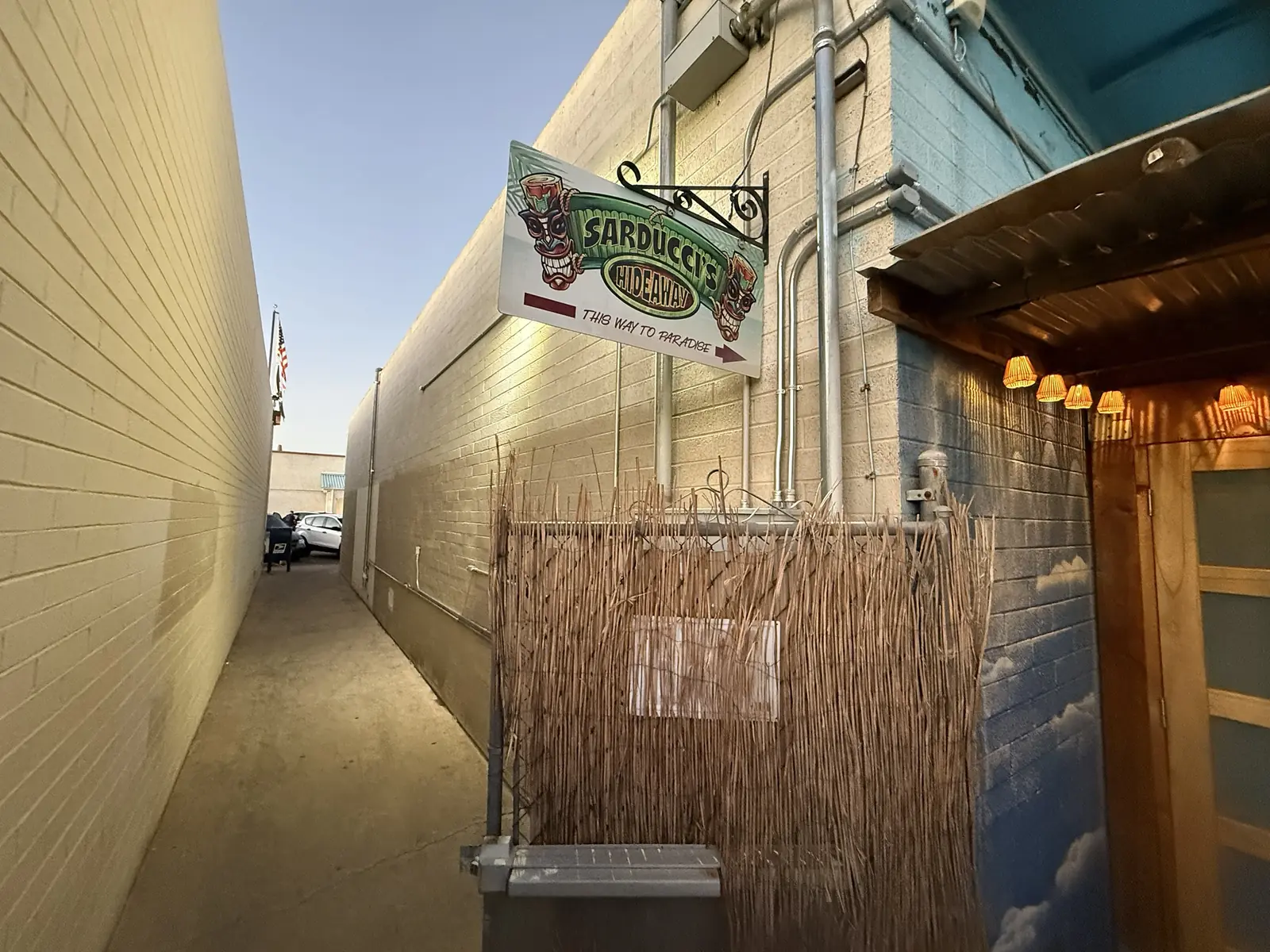 Sarducci's Hideaway sign in the alley